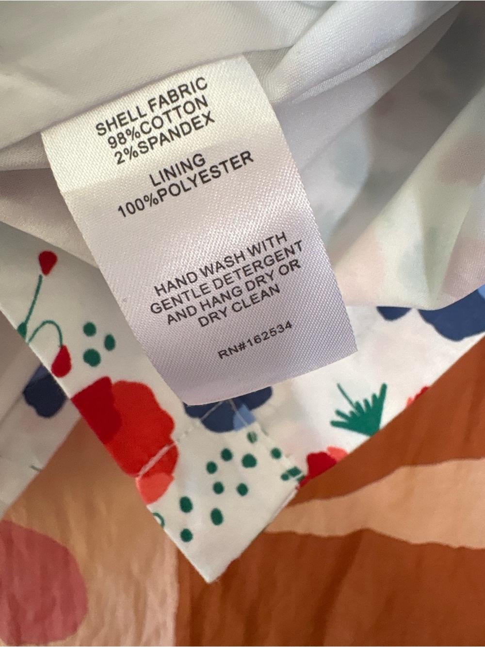 Emily McCarthy Floral Popover Blouse in White with Red & Blue Print - Picture 5 of 5